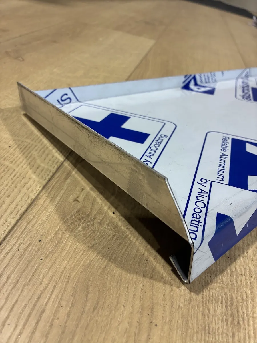 Pièce en tôle pliée et cisaillée sur mesure, atelier de pliage de Veauche, réalisation 31